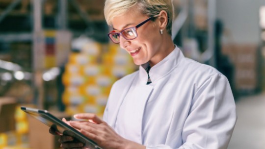 business women standing in warehouse